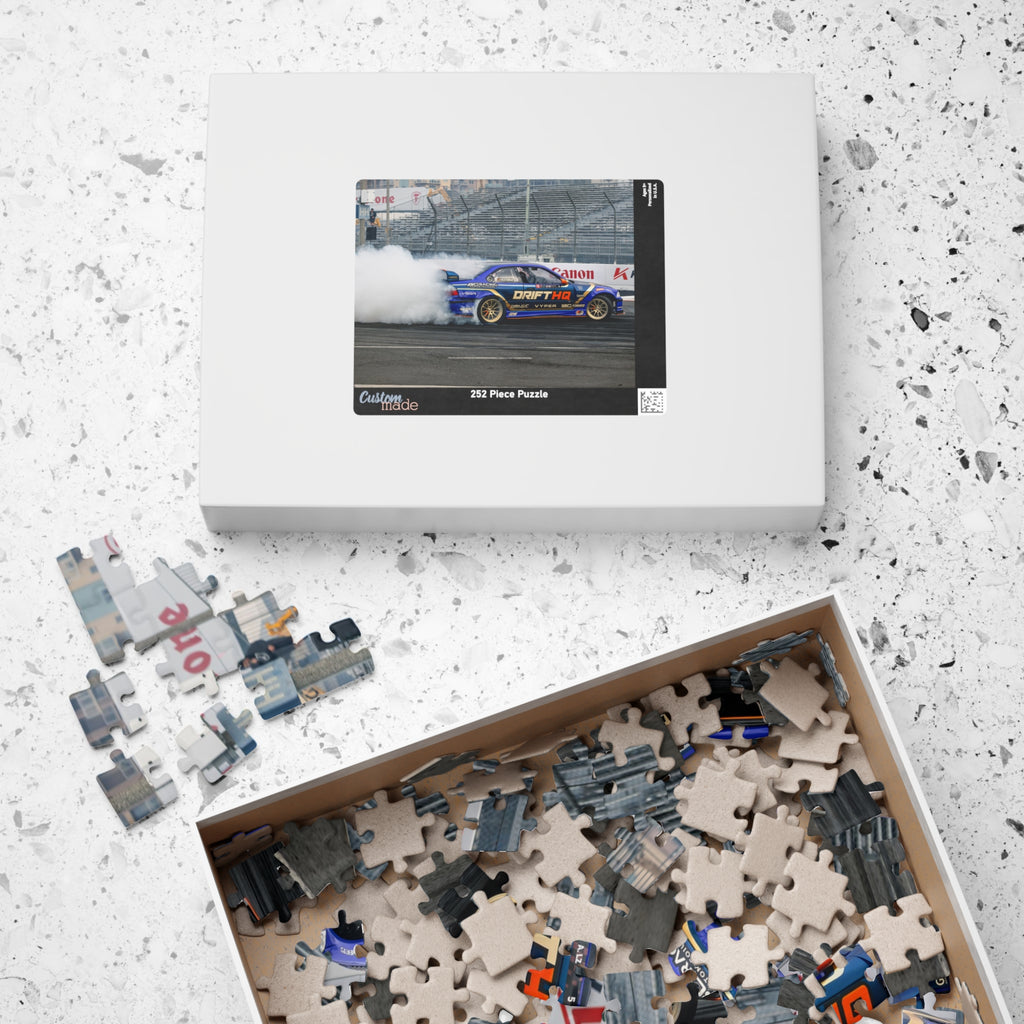 Adam LZ drift car jigsaw puzzle featuring a blue drift car and smoky racetrack scene