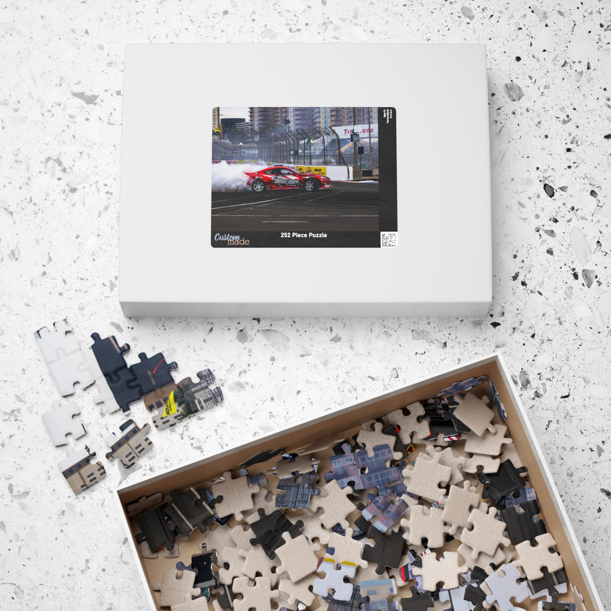 Diego Higa red drift car puzzle featuring a smoky racetrack drifting scene